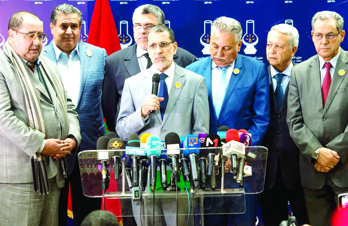 Morocco's new PM Saad Eddine El-Othmani, center, during a press conference, with coalition leaders on Saturday. (AFP)
