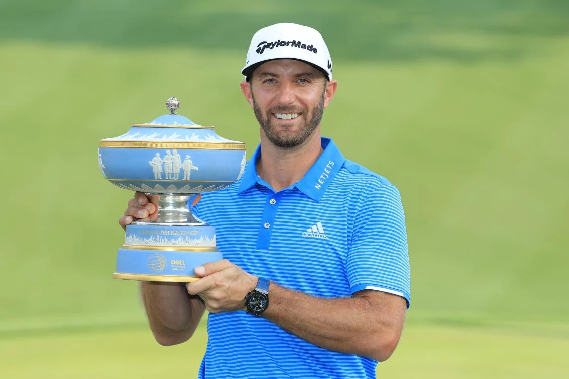Dustin Johnson with the trophy after winning the World Golf Championships at the Austin Country Club on Sunday. (AFP)