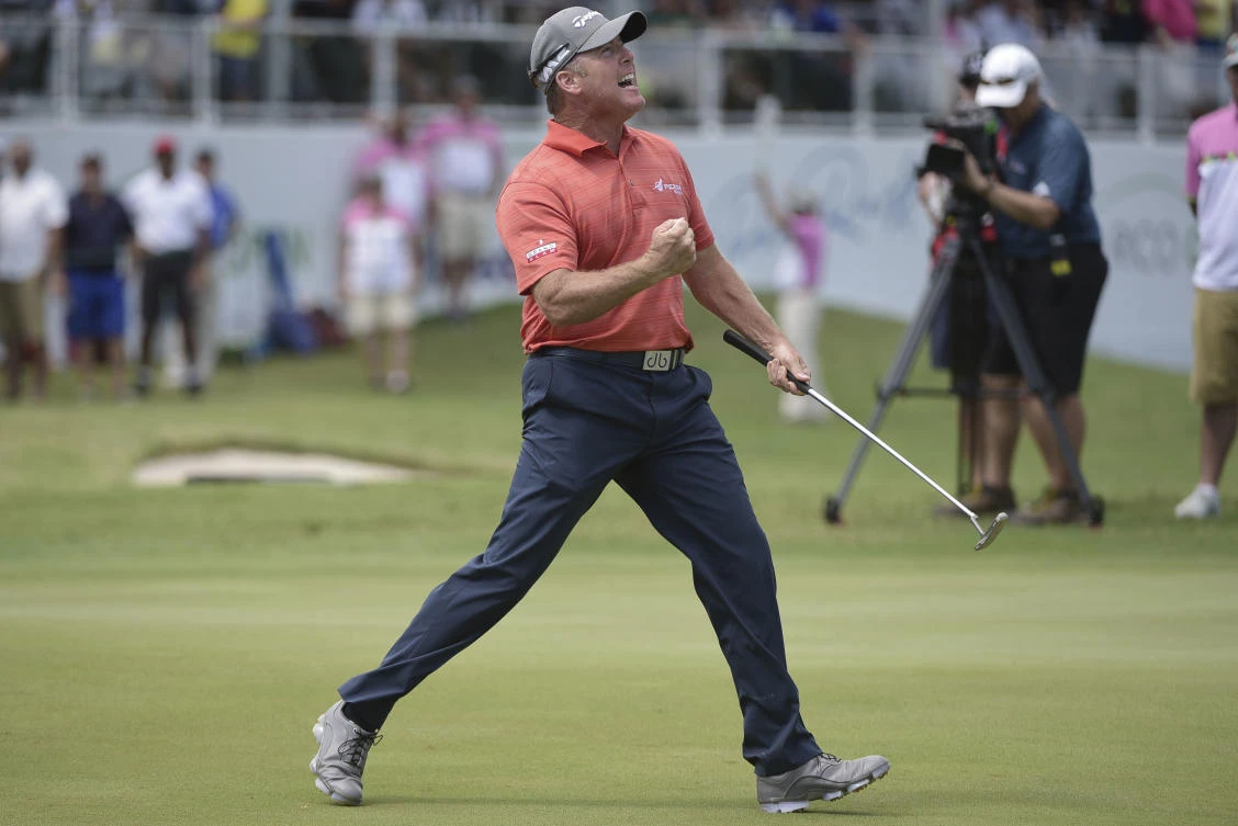 D.A. Points celebrates after making his last putt on the 18th hole winning the Puerto Rico Open final round in Rio Grande, Puerto Rico, on Sunday. (AP)