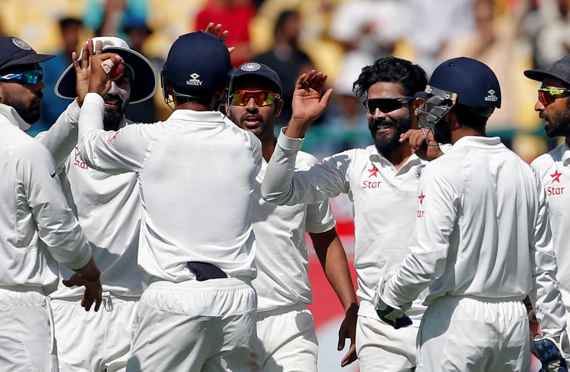 India's Ravindra Jadeja, third right, celebrates with his teammates after dismissing Australia's Shaun Marsh during the India vs. Australia fourth Test cricket match at Himachal Pradesh Cricket Association Stadium in Dharamsala, India. (Reuters)