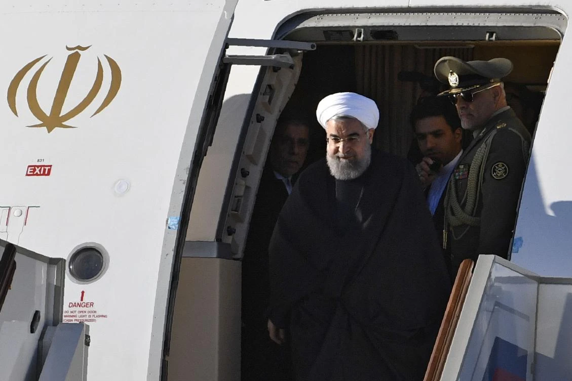 Iranian President Hassan Rouhani gets off a plane upon his arrival at Moscow’s Vnukovo Airport (AFP)