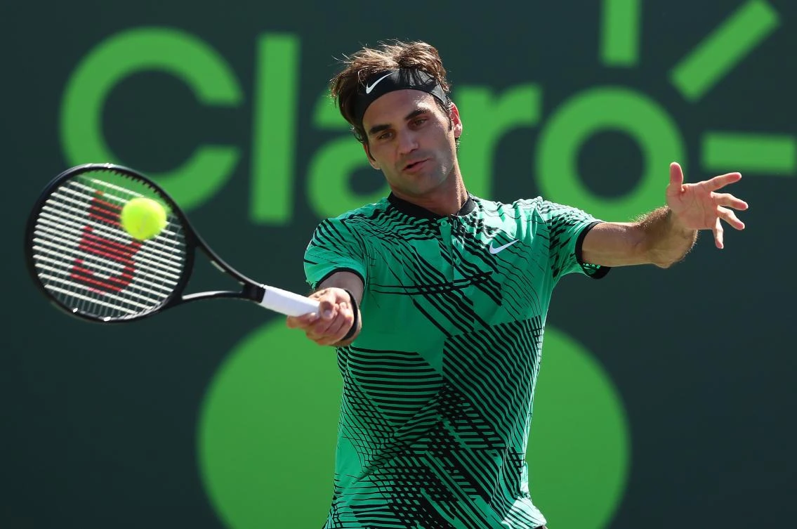 Roger Federer of Switzerland returns a shot against Juan Martin Del Potro of Argentina during Day 8 of the Miami Open at Crandon Park Tennis Center on Monday in Key Biscayne, Florida. (AFP)