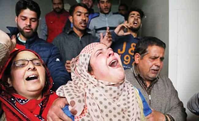 Relatives mourn the loss of a Kashmiri civilian in Srinagar on Tuesday. (AP)
