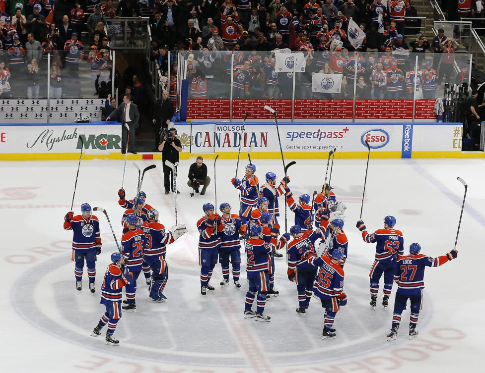 The Edmonton Oilers celebrate a 2-1 victory over the Los Angeles Kings at Rogers Place on Tuesday. The win guarantees them a playoff spot for the first time in 10 seasons. (USA TODAY Sports)