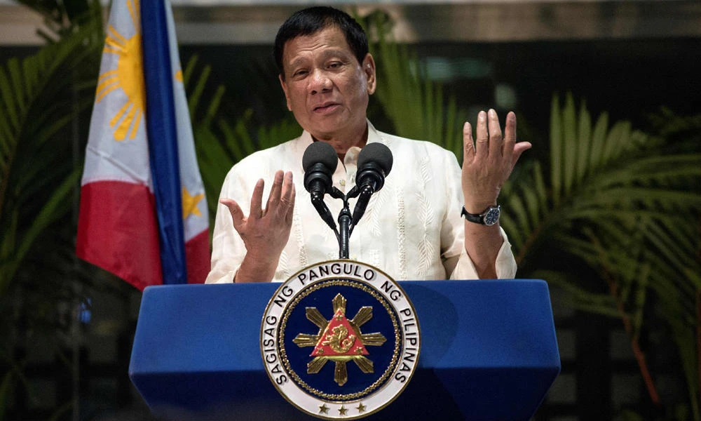 Philippine President Rodrigo Duterte gestures as he answers questions from the press at Manila International Airport on March 23, 2017. (AFP / NOEL CELIS)