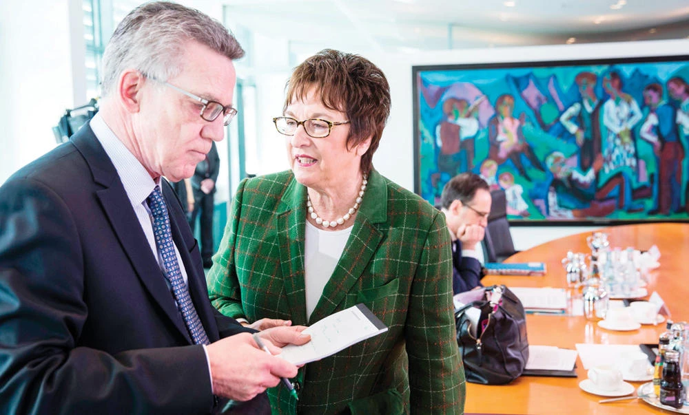 German Economy and Energy Minister Brigitte Zypries with Interior Minister Thomas de Maiziere at
a recent Cabinet meeting in Berlin. (AFP)
