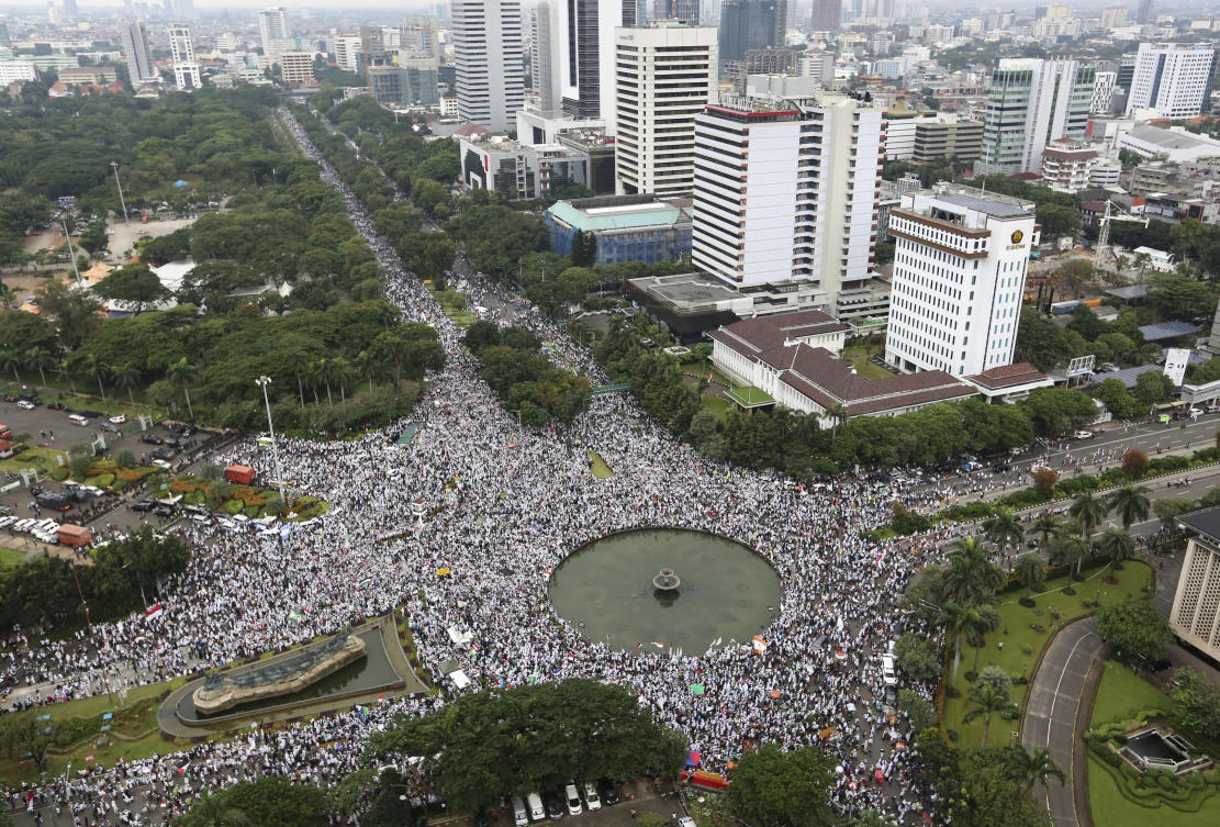 Muslim protesters gather for a protest against Jakarta's minority Christian Governor. (AP)