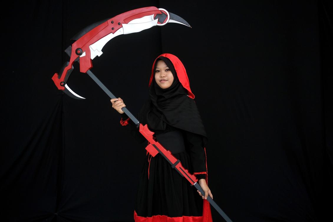 Ayesha, a young Muslim cosplayer dressed as "Ruby Rose", takes part in the "Hijab Cosplay" event in Subang Jaya, outside of Kuala Lumpur, on Saturday. (AFP / Manan Vatsyayana)