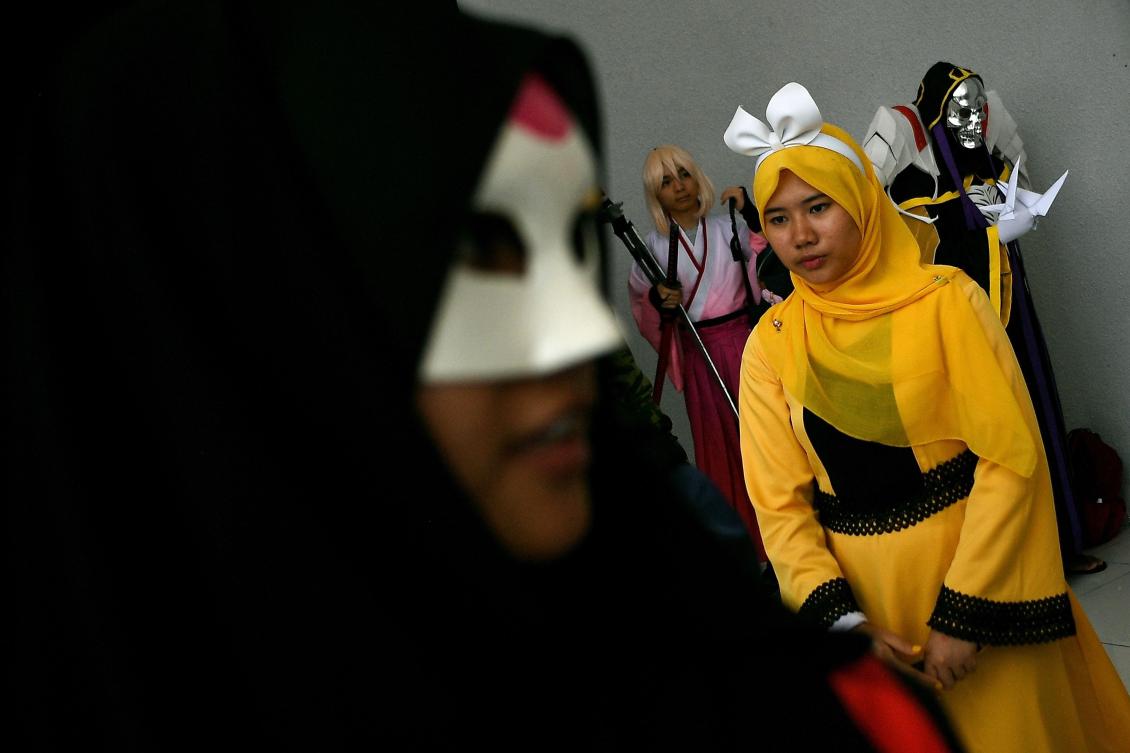 Muslim cosplay enthusiasts take part in the "Hijab Cosplay" event in Subang Jaya, outside of Kuala Lumpur, on Saturday. (AFP / Manan Vatsyayana)