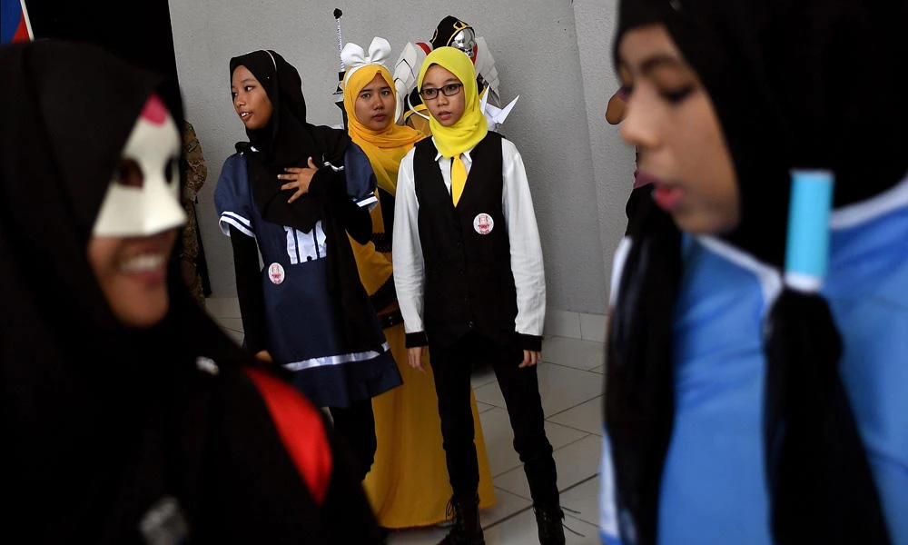 Muslim cosplay enthusiasts take part in the "Hijab Cosplay" event in Subang Jaya, outside of Kuala Lumpur, on Saturday. (AFP / Manan Vatsyayana)