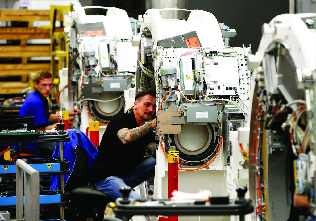 Jobs, wages and working conditions are set to be a key battleground in German elections slated for September, with left-wing politicians pushing for higher wages and more unemployment protection. (Reuters)
