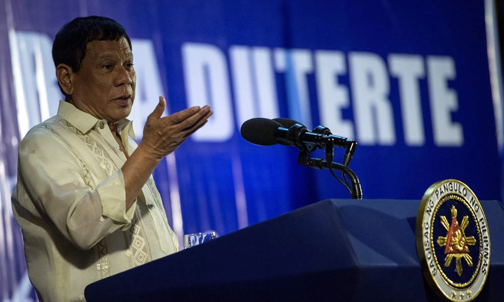Philippine President Rodrigo Duterte delivers a speech during the "Digong's Day for Women" event on Friday. (AFP / NOEL CELIS)