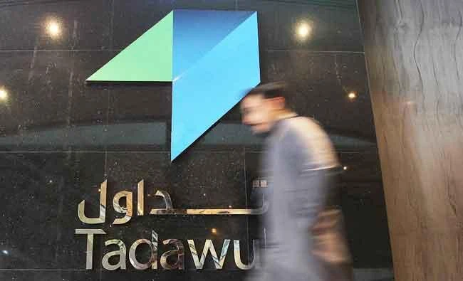 An investor walks at the Saudi Stock Exchange (Tadawul) in Riyadh, Saudi Arabia, in this January 18, 2016 file photo. (REUTERS)
