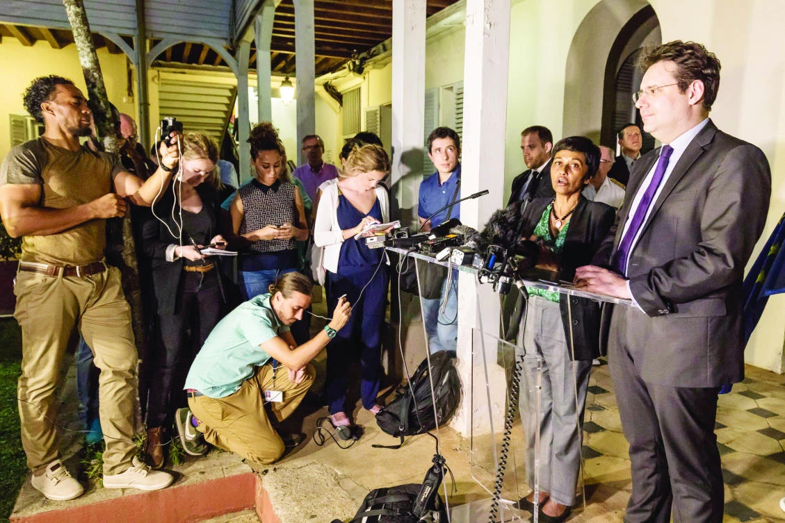 French Interior Minister Fekl Matthias and French Minister of Overseas Territories Ericka Bareigts speak at a press conference in Cayenne, French Guiana on Saturday. (AFP)