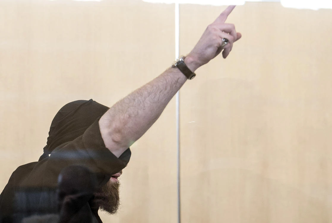 Defendant Marco G. stands in the courtroom during his trial in Duesseldorf, Germany. (Federico Gambarini/dpa via AP)