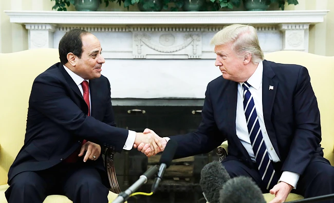 President Donald Trump shakes hands with Egyptian President Abdel Fattah El-Sisi in the Oval Office of the White House. (AP Photo/Evan Vucci)