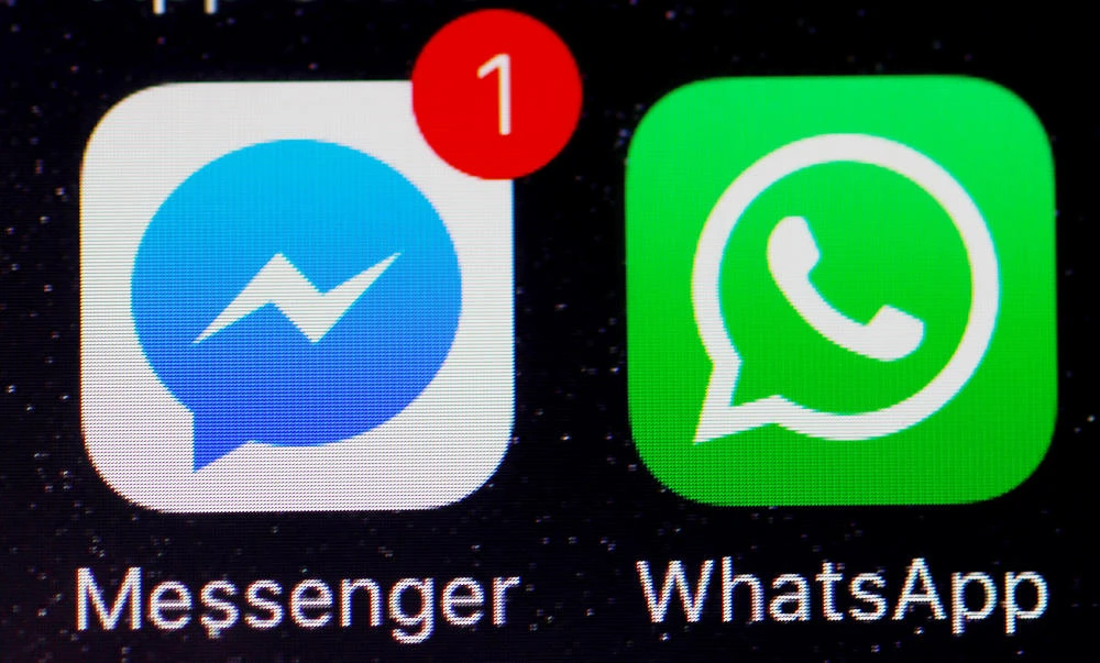 WhatsApp and Facebook messenger icons are seen on an iPhone in Manchester, Britain, in this March 27, 2017 photo. (REUTERS)