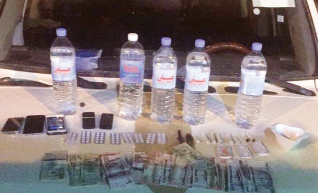 Alcohol, narcotic pills and hashish, as well as money revealed from drug traffickers in the Ramah region. (AN photo)