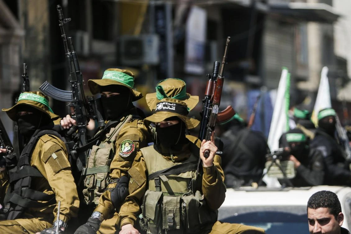 Members of the Ezzedine Al-Qassam Brigades, the military wing of the Palestinian Islamist movement Hamas attend the funeral of Hamas official Mazen Faqha in Gaza city . Gunmen in the Gaza Strip had shot dead the Hamas official. (AFP)