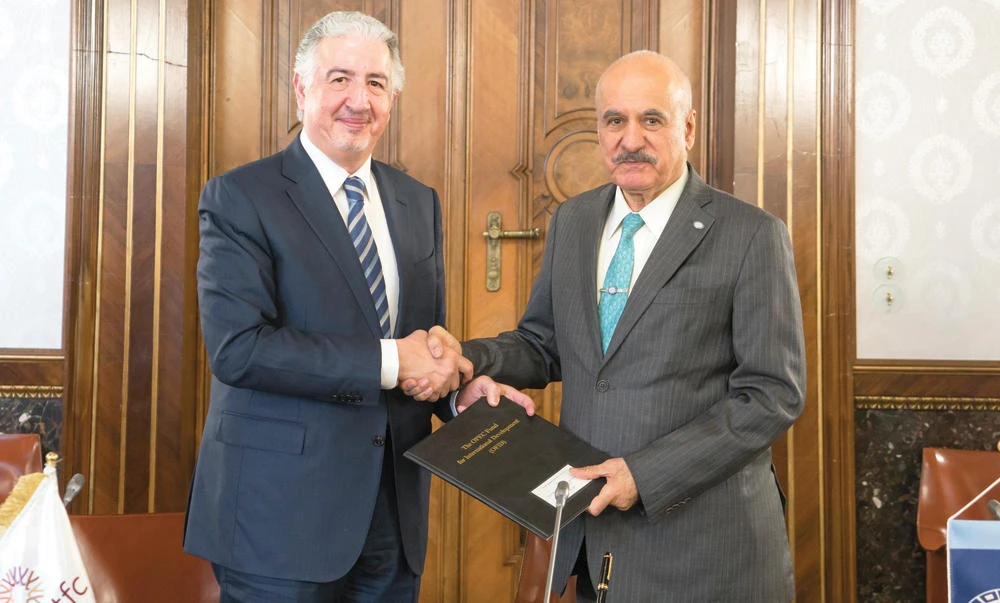 Hani Salem Sonbol, CEO of the International Islamic Trade Finance Corporation (ITFC), left, and Suleiman J. Al-Herbish, OFID director-general.