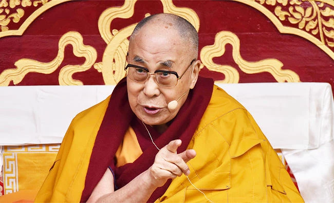 Exiled Tibetan spiritual leader the Dalai Lama delivers religious teachings to Buddhist followers at the Buddha Stadium in Bomdila in India's north-eastern state of Arunachal Pradesh state on Wednesday. (AFP)