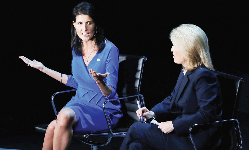 A journalist, right, interviews US Ambassador to the UN, Nikki Haley, during the opening night of the Women In The World Summit in New York, on Wednesday. (Reuters)