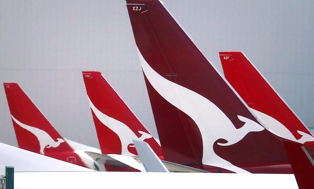 Qantas Airways planes sit on the tarmac at Sydney’s Kingsford Smith International Airport. (Reuters)