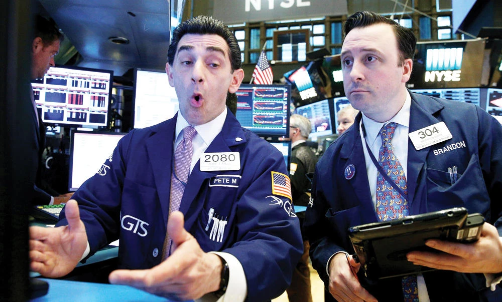 Traders work on the floor of the New York Stock Exchange. (Reuters)