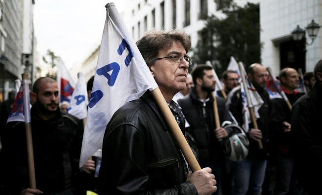 People protest against the government's austerity reform program in Athens, Greece. (Reuters)