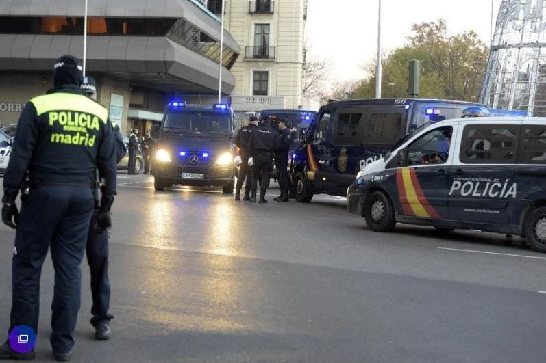 Police are seen on a street in Madrid in this file photo. (AFP)