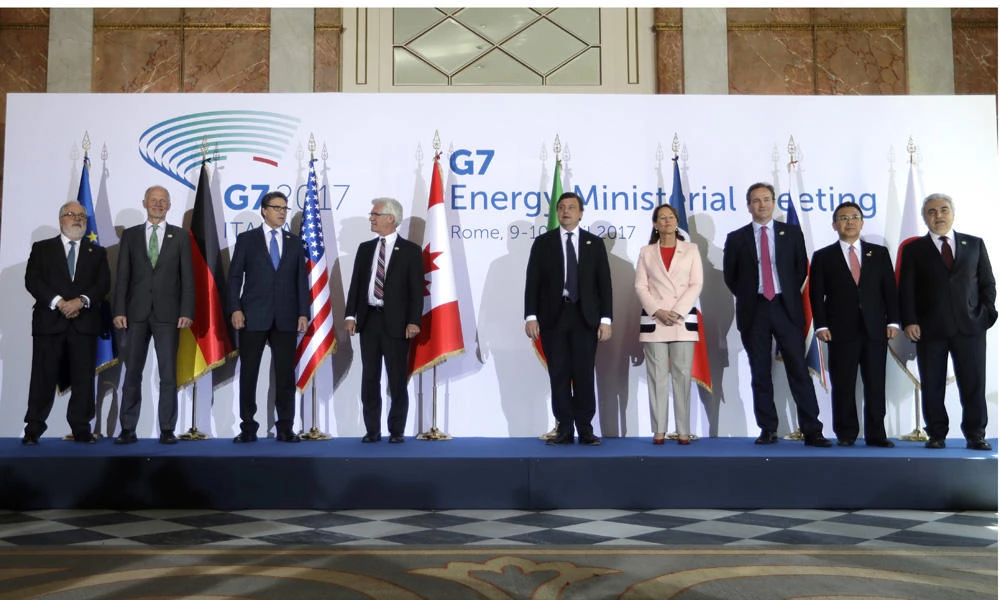 From left, European Commissioner for Cimate, Miguel Arias Canete, Energy ministers, Germany's Rainer Baake, United States' Rick Perry, Canada's James Gordon Carr, Italy's Carlo Calenda, France's Segolene Royal, Britain's Nick Hurd, Japan's Yosuke Takagi and International Energy Agency Executive Director Faith Birol pose for a family photo during a G7 Energy meeting in Rome on Monday (AP Photo/Alessandra Tarantino)