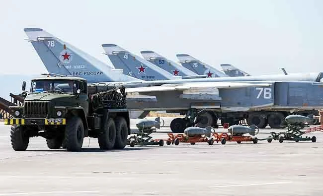 In this June 18, 2016 file photo, Russian fighter jets and bombers are parked at Hemeimeem air base in Syria. (AP)