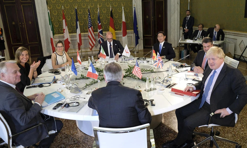 From left: France Foreign Minister Jean-Marc Ayrault, High Representative of the European Union for Foreign Affairs and Security Policy Federica Mogherini, Canadian Foreign Minister Chrystia Freeland, Italian Foreign Minister Angelino Alfano, Japanese Foreign Minister Fumio Kishida, Secretary of State for Foreign and Commonwealth Affairs Boris Johnson and US Secretary of State Rex Tillerson, sit at the table during the meeting of Foreign Ministers of the G7 countries in Lucca, Italy, on Monday. (Riccardo Dalle Luche/ANSA via AP)