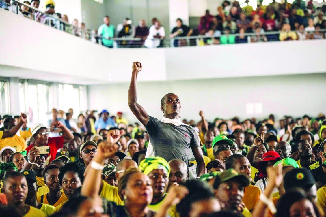 A member of the African National Congress shouts in support of South African President Jacob Zuma during a recent meeting in Durban. (AFP)