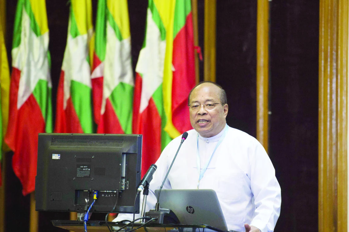 Myanmar’s national security advisor Thaung Tun, briefs diplomats from the embassy at the NRPC (National Reconciliation and Peace Centre) in Yangon on Tuesday. (AFP)