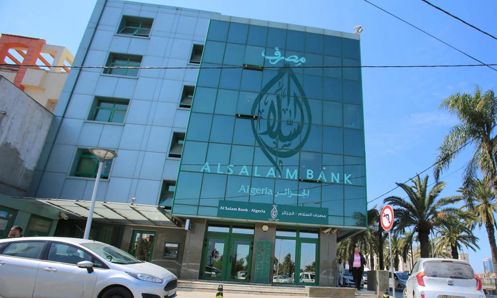 A man walks outside Al Salam Bank in Algiers city, Algeria, on April 5, 2017. (REUTERS/Ramzi Boudina)