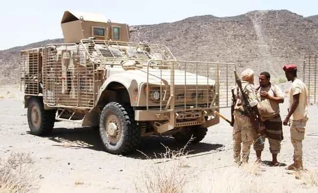 Yemeni loyalist forces gather outside the west of the Yemeni coastal port town of Mokha, on Wednesday. (AFP)