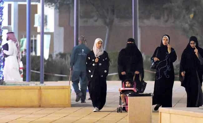 A general view taken on July 13, 2015 shows Saudi women walking in the restored historical Al-Bureji area in the UNESCO World Heritage Atturaif district on the outskirts of Riyadh. (AFP)