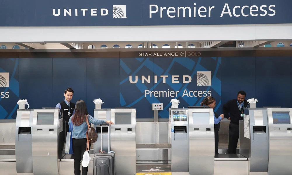 Passengers arrive for flights at the United Airlines terminal at O'Hare International Airport on April 12, 2017 in Chicago, Illinois. United Airlines has been struggling to repair their corporate image after a cell phone video was released showing a passenger being dragged from his seat and bloodied by airport police after he refused to leave a reportedly overbooked flight that was preparing to fly from Chicago to Louisville. (Scott Olson/Getty Images/AFP)