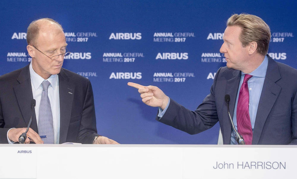John Harrison, group general counsel at Airbus Group, gestures as he speaks to Tom Enders, CEO of Airbus Group,
during the annual meeting of aircraft manufacturer Airbus Group in Amsterdam on Wednesday. (AFP)