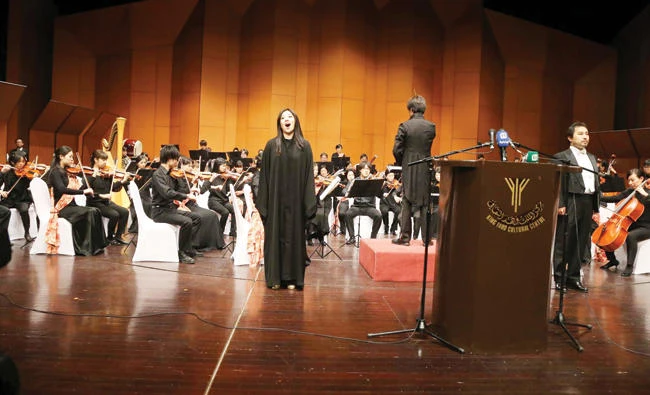 Japanese orchestra members perform at a concert in Riyadh Thursday. (AN photo by Bashir Saleh)