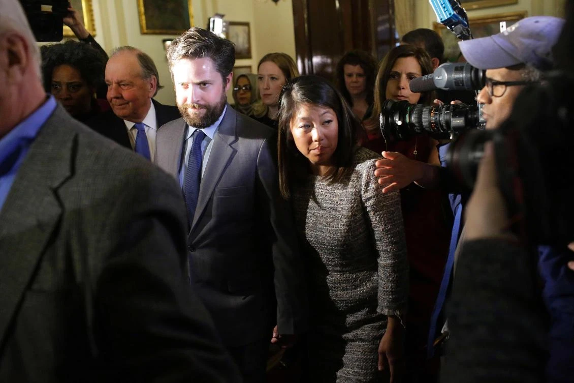 Crystal Dao Pepper (C), leaves a news conference for her father Dr. David Dao in Chicago, Illinois. (AFP)