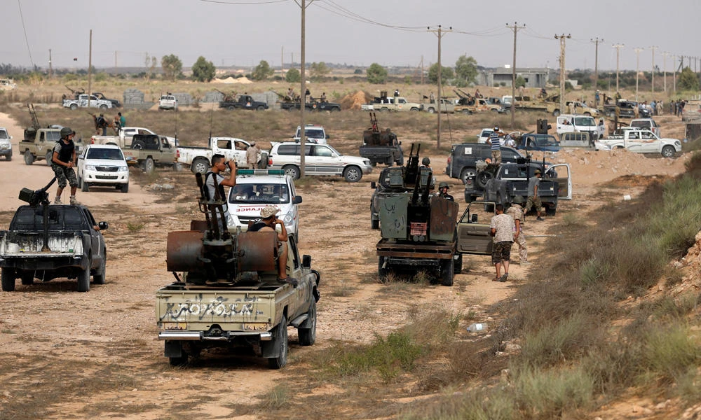 Libyan forces allied with the UN-backed government look at Daesh fighters' positions before a battle in Sirte, Libya, in this July 15, 2016 file photo. (REUTERS/Goran Tomasevic)