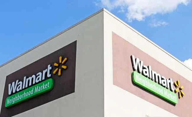 This Feb. 8, 2017 photo shows Wal-Mart signage at one of the company's neighborhood markets, in Hialeah, Fla. (AP)
