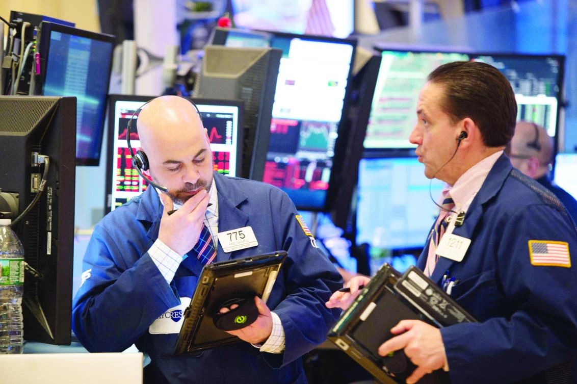 Traders works on the floor of the New York Stock Exchange. (AFP)