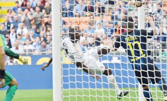 AC Milan's defender from Colombia Cristian Zapata scores during the Italian Serie A football match Inter Milan vs. AC Milan at San Siro Stadium in Milan on Saturday. (AFP)