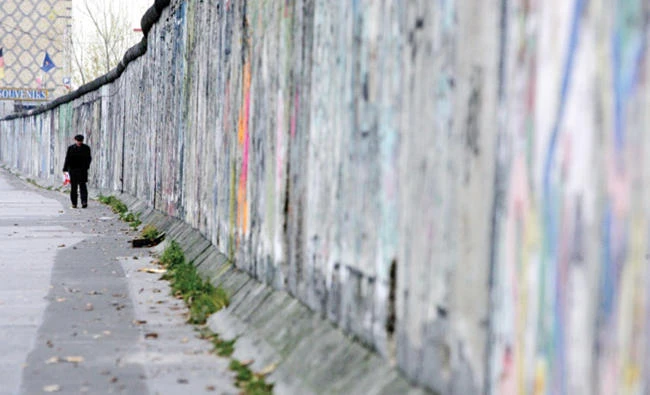 When the Berlin Wall fell in 1989, most Mozambicans who had arrived in pre-unification East Germany, found themselves stripped of their jobs and housing. (AFP)