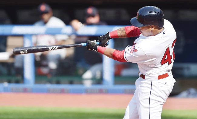 Cleveland Indians second baseman Jose Ramirez hits a three run home run during the first inning against the Detroit Tigers at Progressive Field on Saturday. (USA TODAY Sports)
