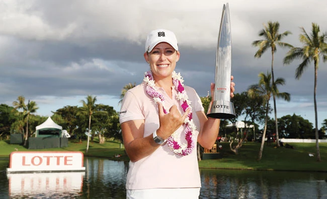 Cristie Kerr with the trophy after winning in the final round of the LPGA LOTTE Championship presented by Hershey at Ko Olina Golf Club on Saturday in Kapolei, Hawaii. (AFP)