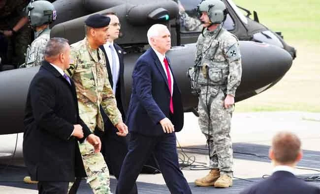 US Vice President Mike Pence (C) arrives at army base Camp Bonifas in Paju near the truce village of Panmunjom during a visit to the Demilitarized Zone (DMZ) on the border between North and South Korea on Monday. (AFP)